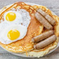 Buttermilk Pancake Breakfast* · Two pancakes, two eggs and four strips of bacon or four sausage links.