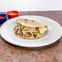 Gordita · 6 inches homemade thick tortilla filled with cheese and meat of your choice. Garnished with ...