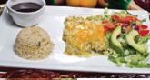Spinach Enchiladas · 3 spinach enchiladas covered with red sauce and cheese.