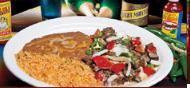 Steak Picado · 10 oz. rib-eye chunks mixed with jalapeno peppers, onions and tomatoes Served with rice, bea...