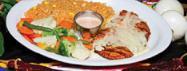 Pollo Ranchero · Grilled chicken breast topped with cheese, served with steamed vegetables, rice, lettuce and...