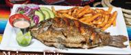Mojarra Frita · Fried tilapia served with lettuce, pico de gallo, sliced avocado and french fries. Allow 30 ...