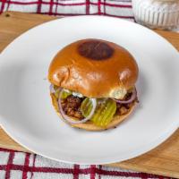 #9 BBQ Pulled Pork Sandwich · Chopped pork, BBQ sauce, pickles, onions and mayonnaise.