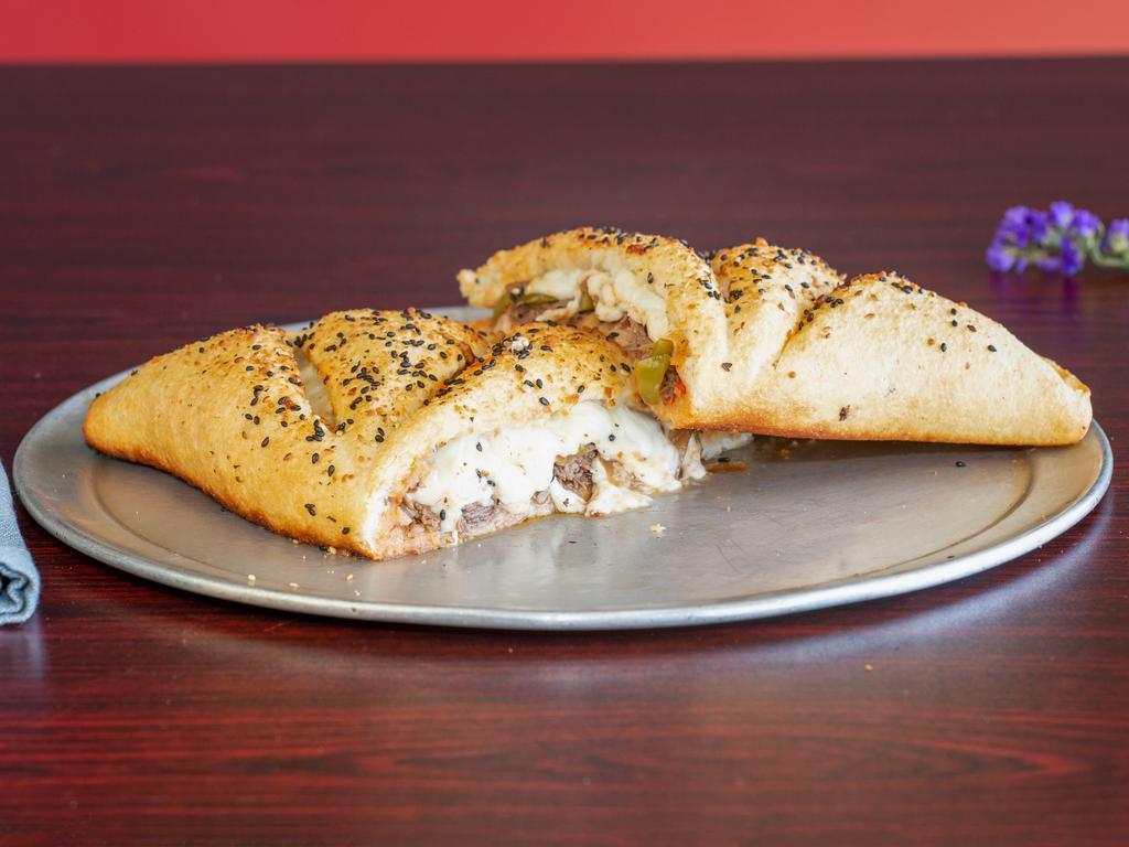 Calzone · Made with our famous freshly made dough 12” with a special seasoning and stuffed with mozzarella cheese and your choice of pizza sauce or a butter base complimented with a side of ranch and marinara.