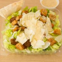 Caesar Salad · Romaine lettuce, croutons, hard boiled eggs and fresh Parmigiana cheese.