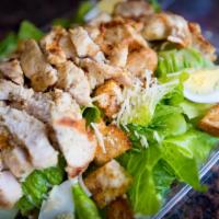 Chicken Caesar Salad · Grilled chicken, romaine lettuce, croutons, hard boiled eggs and fresh Parmigiana cheese.