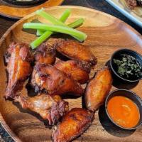 Beer Brined Chicken Wings · Hot Buffalo or hoisin BBQ with blue cheese or ranch dressing. 8 wings per order