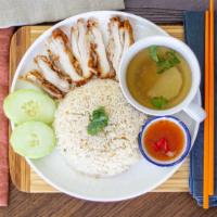 Khao Man Gai Tot / Fried Chicken & Rice / ข้าวมันไก่ทอด · Fried chicken, rice, served with cucumber, soup and sweet chili sauce.