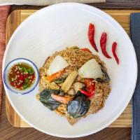 Khao Pad Kee Mao / Spicy Basil Fried Rice / ข้าวผัดขี้เมา · Rice, carrot, onion, basil, chili, choice of chicken or pork served with soup, an egg roll a...