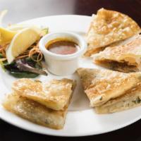 Scallion Pancake · Served with curry dip.