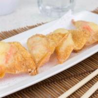 Crab Poppers · Four pieces. Kani and cream cheese wrapped in crispy wonton skin.