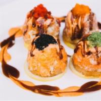 Four Spicy Seasons · Freshly made spicy tuna, spicy salmon, spicy yellowtail and spicy shrimp, served over warm c...
