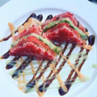 Sushi Sandwiches · Two pieces. Spicy tuna, spicy salmon, avocado, crunch with red caviar in pink soy paper, spi...
