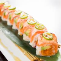 Pink Nori Roll · Seared salmon and serrano on top, cooked shrimp, avocado, tempura flakes and caviar wrapped ...