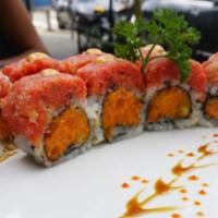 Spicy Geisha Roll · Spicy salmon and spicy yellowtail inside, Spicy tuna on top with crunch and spicy mayo.