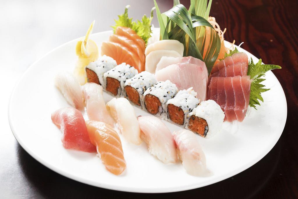 Sushi and Sashimi Combination Entree · Ten pieces of sashimi, six pieces of sushi and one spicy tuna roll. Served with your choice of miso soup or salad.