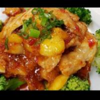 Mango Chicken · Sliced white meat chicken sauteed with mango and served with broccoli. Served with miso soup...
