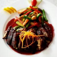 Balsamic Boneless Roast Duck · Roasted duck in a red wine balsamic sauce with seasonal vegetables. Served with miso soup an...