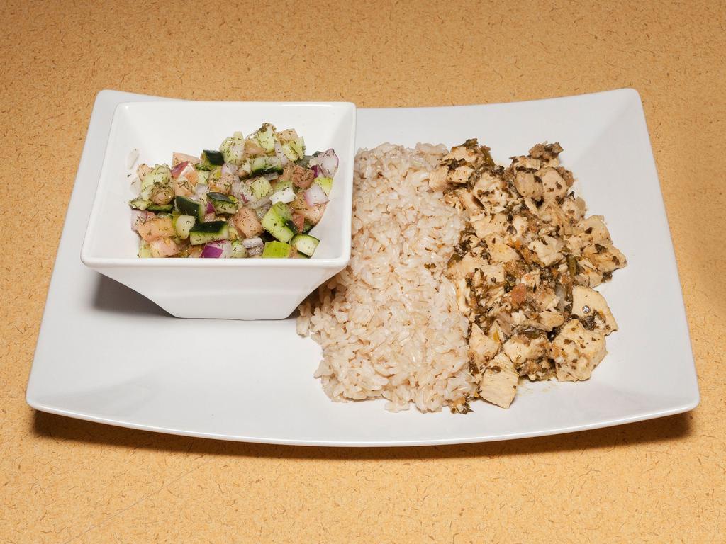 Mediterranean Chicken Bowl · Seasoned chicken breast, tomatoes, onions, brown rice and Israeli salad on the side.