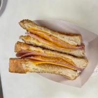Toasted Ham & Cheese Sandwich · Toasted New York Sharp Cheese and Cooked Ham slices on Buttered Texas Toast Bread