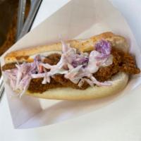 Carolina Dog · 100% All Beef Hotdog with House made Chili and Slaw