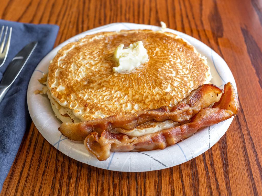 Pancakes · Served with sausage or bacon.