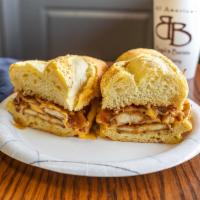 Chicken Valley Sandwich · Chicken cutlet layered with bacon and melted american cheese covered in gravy on a bagel or ...