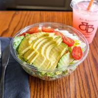 Cobb Salad · Romaine lettuce, hard-boiled egg, bacon, tomatoes, avocado, corn, crumbled blue cheese and g...