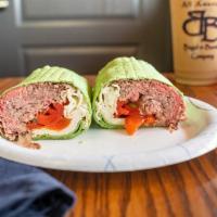 Roast Beef Wrap · Homemade roast beef, fresh mozzarella, roasted peppers and balsamic vinegar and oil.