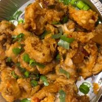 Sweet and Sour Calamari · Tossed in a hot cherry pepper, raisin and sweet and sour sauce.