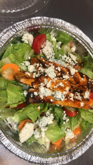 Buffalo Chicken Salad · Grilled or fried chicken, romain lettuce, shredded carrots, cucumber, celery, tomato, bleu cheese with ranch dressing.