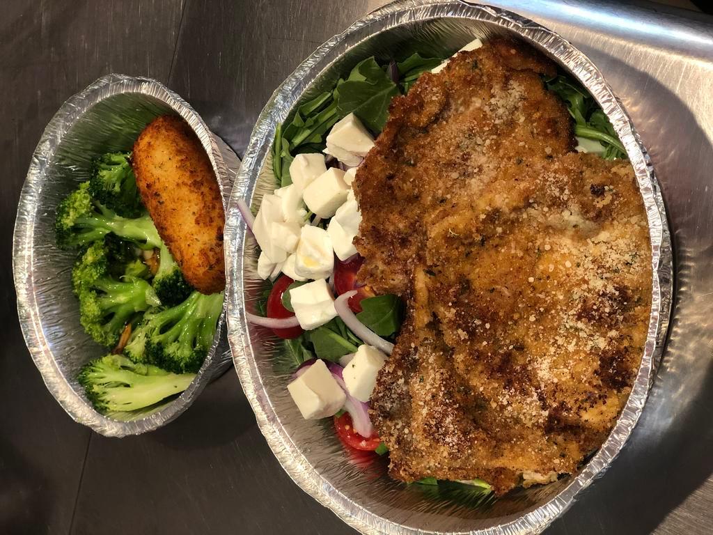 Veal Milanese · Veal cutlet breaded, pan fried, topped with tomato, onion and arugula salad (comes with salad only).