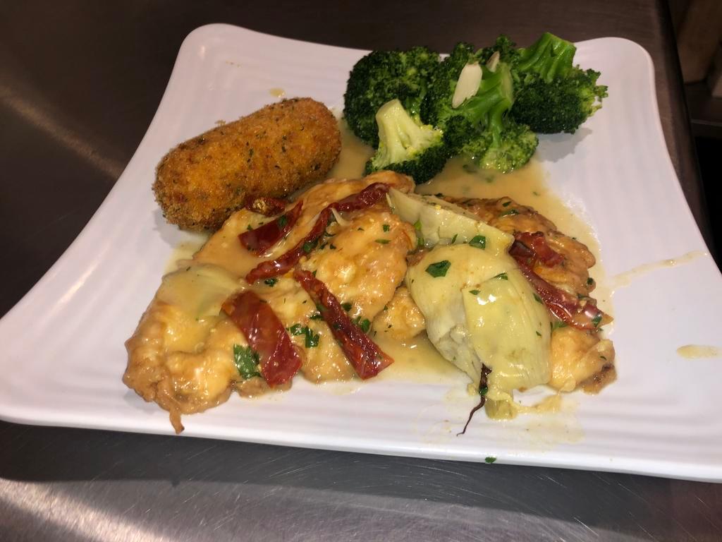 Chicken Francese · Served in a white wine and lemon butter sauce.
