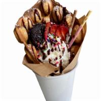 Waffle with topping · Whip cream, strawberry, oreo, chocolate pocky, and strawberry pocky with chocolate syrup