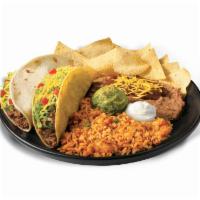 Beef Taco Platter · Enjoy 2 types of tacos, packed with lightly seasoned ground beef. Enjoy all kinds of sides -...
