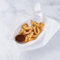 Caribbean Calamari · Crispy squid seasoned with Caribbean spices.  served with homemade  sauce- a captivating fla...