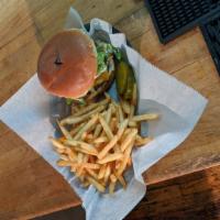 UG Cheeseburger · American cheese, bacon, lettuce, tomato. Served on a potato roll.