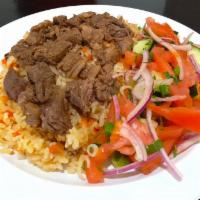 PALOV WITH LAMB · Gluten-free, diary-free Uzbek national dish with rice, meat, carrot, onion, chickpeas. Serve...