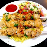 CHICKEN SHASHLIK · marinaded, fire-cooked cubes of chicken breast served with steamed rice, fresh salad and tom...