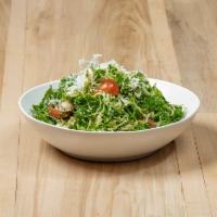 Kale and Brussels Salad · Shaved brussels sprouts and kale, marcona almonds, heirloom tomatoes, and Parmesan Reggiano....