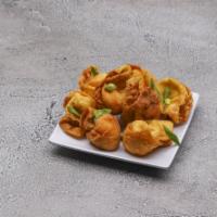12c. Cheese Wonton · 8 Pieces Served with Sweet and Sour Sauce on the side
