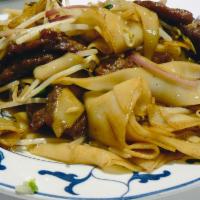 94. Beef Chow Ho Fun · Flat noodles.