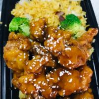 Sesame Chicken Combination Plate · Served with roast pork fried rice and an egg roll. Spicy.