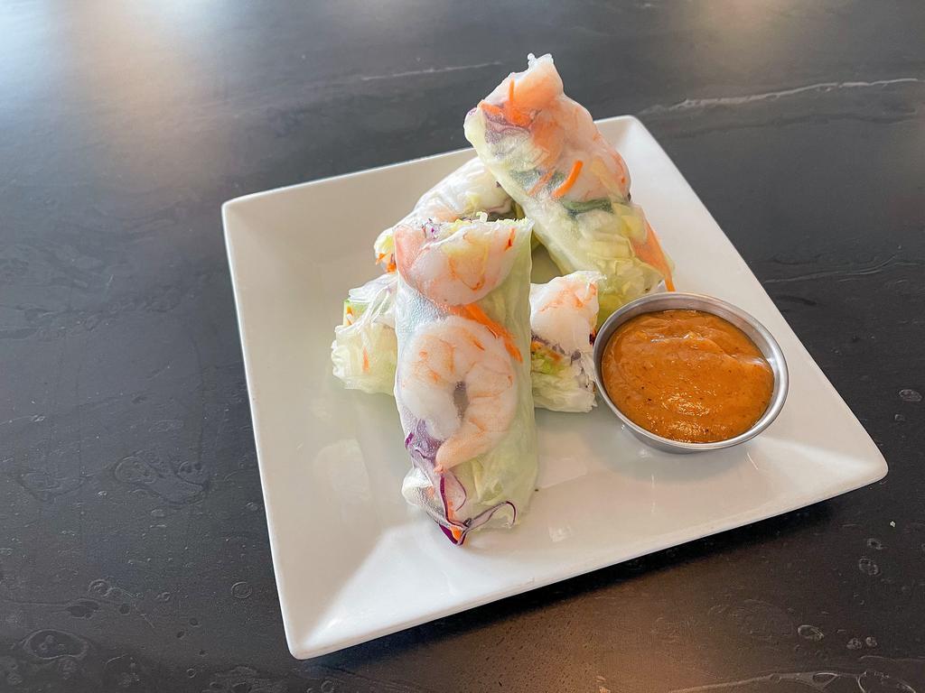 SALAD ROLLS (V)(GF) · Gluten-free. Vegan. Lettuce, carrots, rice noodles, cucumber, and basil wrapped in soft rice paper served with peanut sauce.