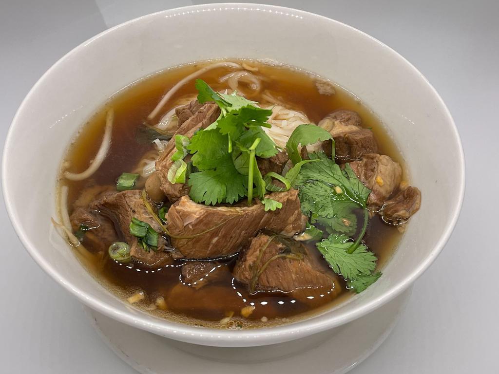 NOODLE BOWL · Chicken Thigh or pork ribs. Pho noodles, bean sprouts, Chinese broccoli, onions, cilantro, and garlic.