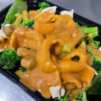 Pra ram (V)(GF) · Gluten-free. Spinach and broccoli topped with peanut sauce.