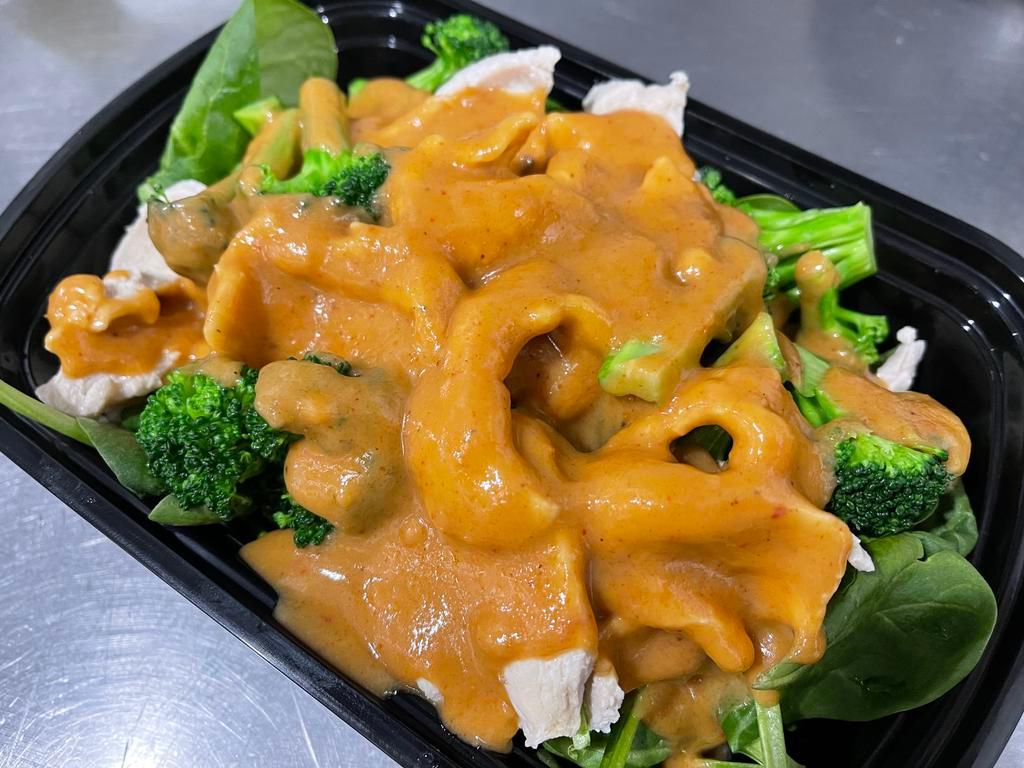 Pra ram (V)(GF) · Gluten-free. Spinach and broccoli topped with peanut sauce.
