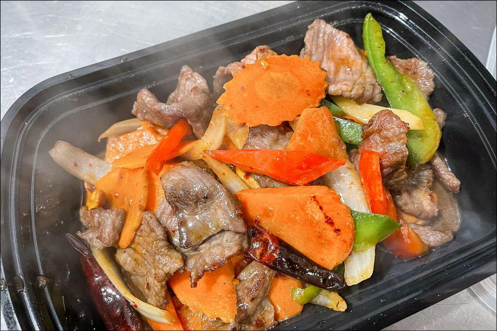 Cashew Nuts · Dried chilies, green onion, yellow onion, carrots, bell pepper, cashew nuts served with white rice. Please ask for Gluten Free or Vegan options.