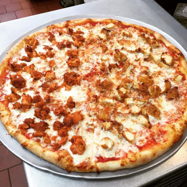 Buffalo Chicken Pizza · Crispy fried chicken breast in mild Buffalo sauce. Choose the size please. 
Any other toppings can be added for extra. 