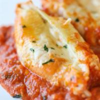 Baked Cheese Stuffed Shells · Pasta shells stuffed with ricotta cheese, baked with tomato sauce and mozzarella cheese.